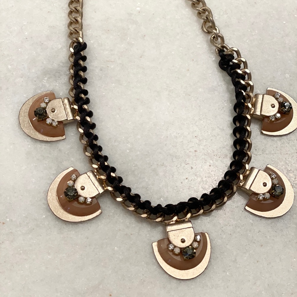 Statement gold tone and gemstone necklace